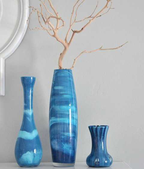  blue decorative vase with dry twigs 