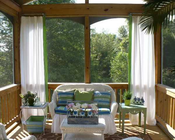 white curtains and outdoor furniture