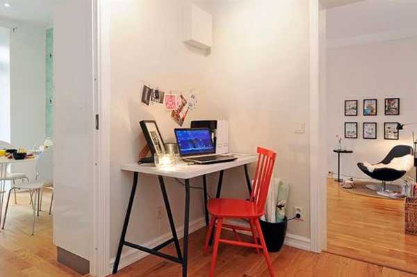 small home office desk and red chair