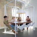 modern table design with hanging chair