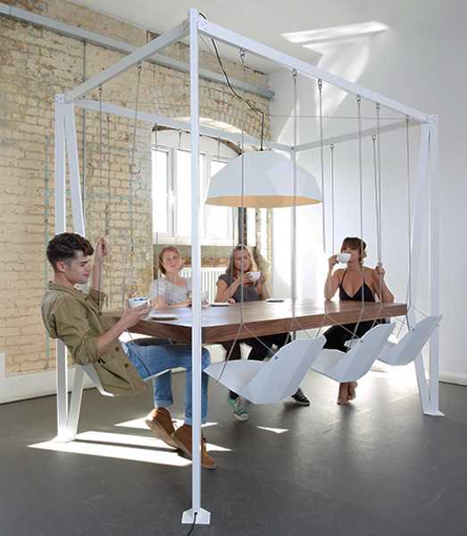modern table design with hanging chair