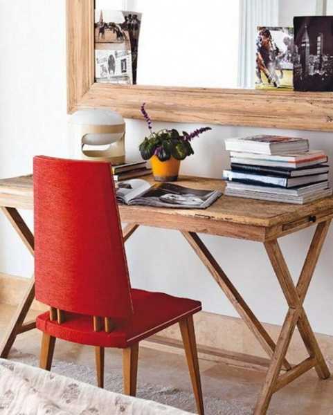 small writing desk and red chair in retro style