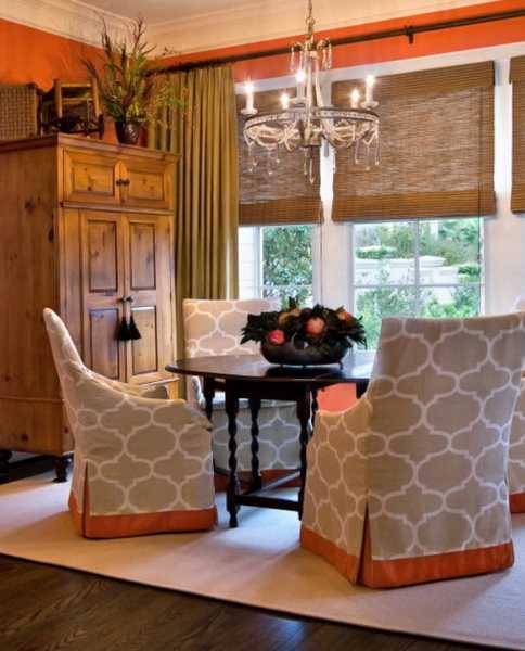 orange accents on dining chair covers