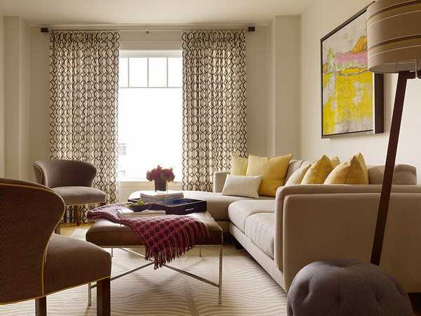 Living room design in yellow and brown colors