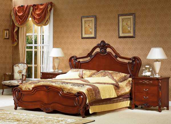bed in classic fabrics with beige comforter