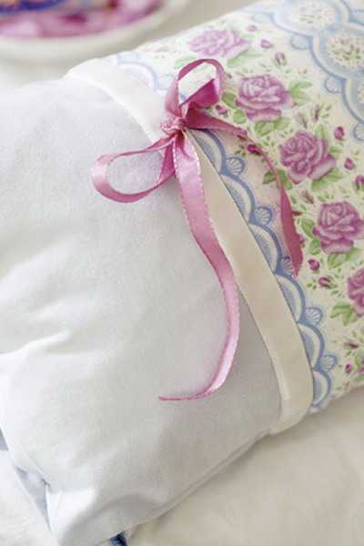 pillow decorating with ribbons and lace