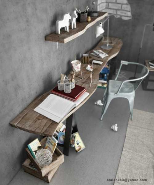  wooden desk and shelves on concrete wall 