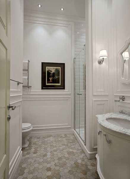 bathroom design with mosaic tiles and marble sink