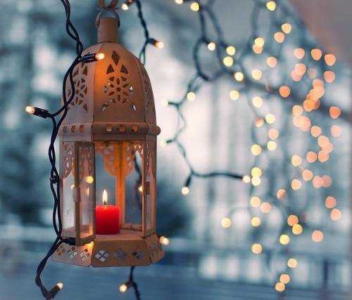 lantern with candles and Christmas lights
