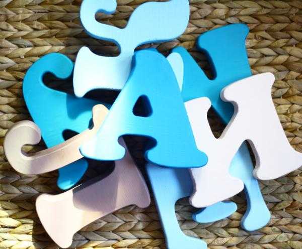  alphabet letters made of wood painted white and blue 