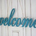 blue painted wooden letters, welcome