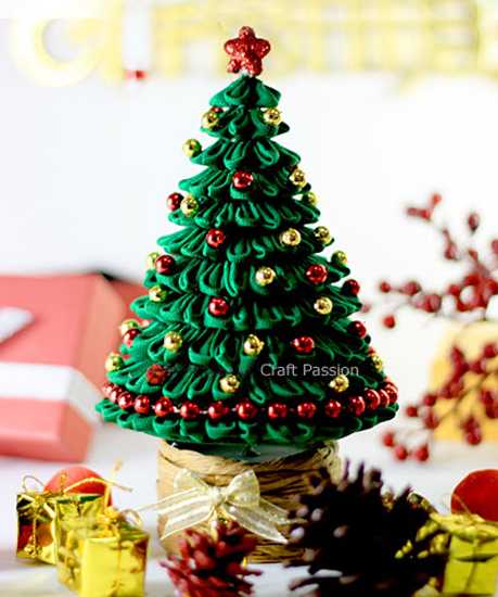 green Christmas tree with fabric and beads