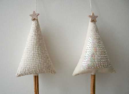 white fabric christmas trees with stars