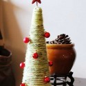 yarn Christmas tree with red ornaments