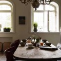 wooden dining table and brass chandeliers for dining room decoration in vintage style