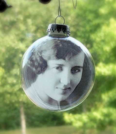 glass Christmas tree decorations with black and white photos