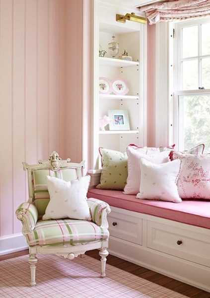 white bench with storage and pink pillow