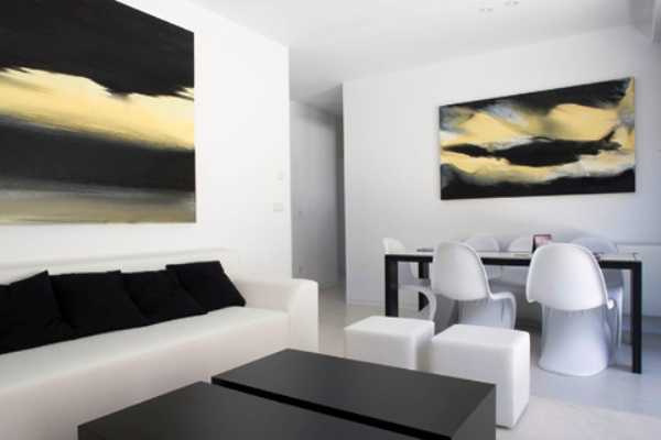 black and white room decor with yellow accents