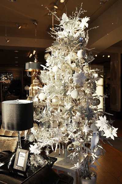 white christmas tree and black decor items