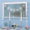 mirror decorated with snowflake garland