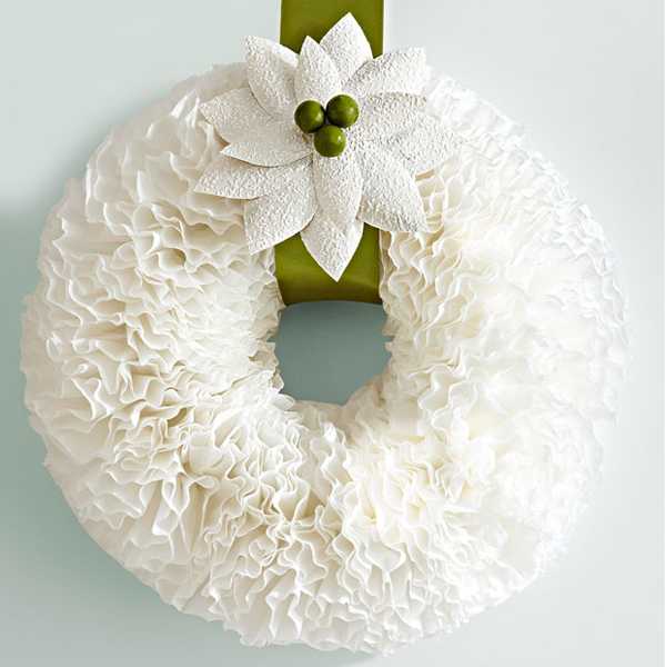 Christmas wreath with white paper flower