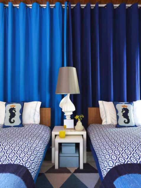 blue curtain on the wall in the bedroom
