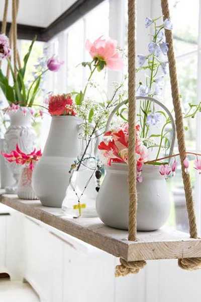  jute rope shlef to display vases with flowers 