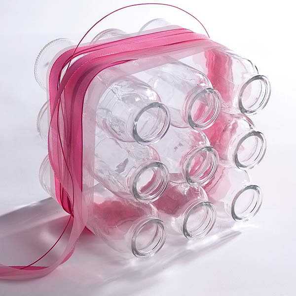 makes decorative vase with glass bottles or jars