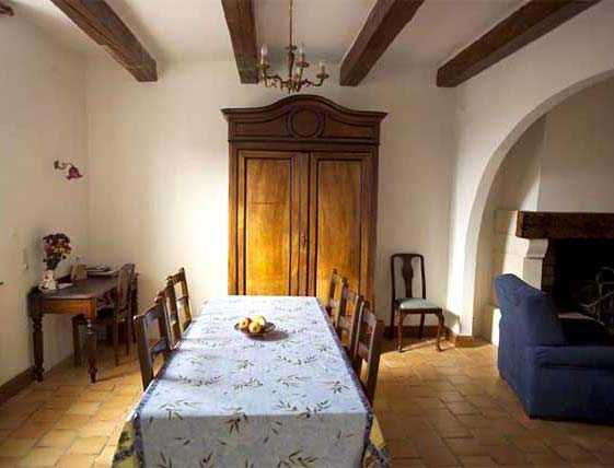 dining room with exposed-beam ceilings