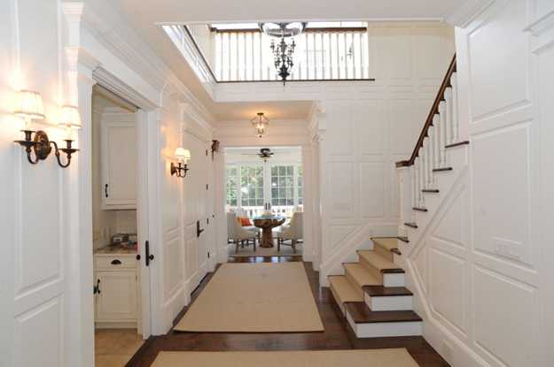 traditional staircase and entryway design
