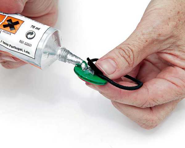 glue and buttons for decorating vases