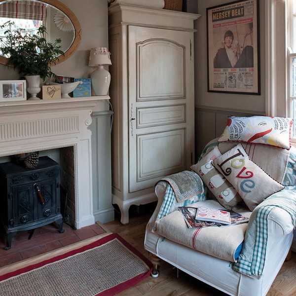 Fireplace with chair and vintage furniture for storing