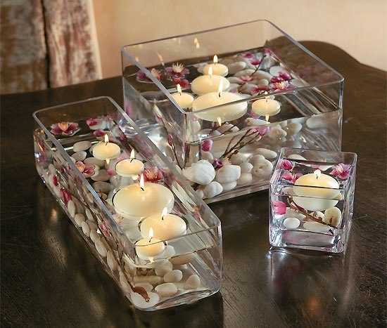 candle centerpieces with flora ting flowera dn candles