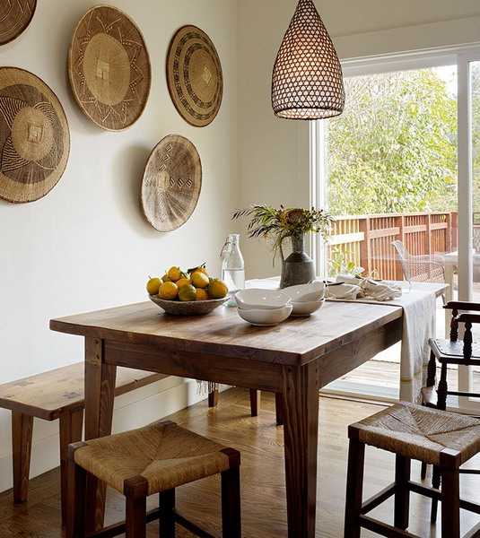 dining room wall decoration with ethnic wicker plates