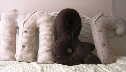 letters and characters shaped pillow
