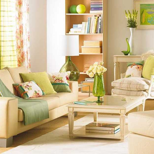 green cushions on white sofa in the living room