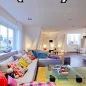 living room decorating with colorful pillows and fabric prints