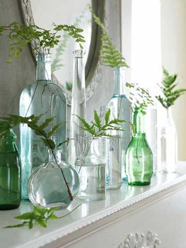 vintage table decoration, glasses and green leaves
