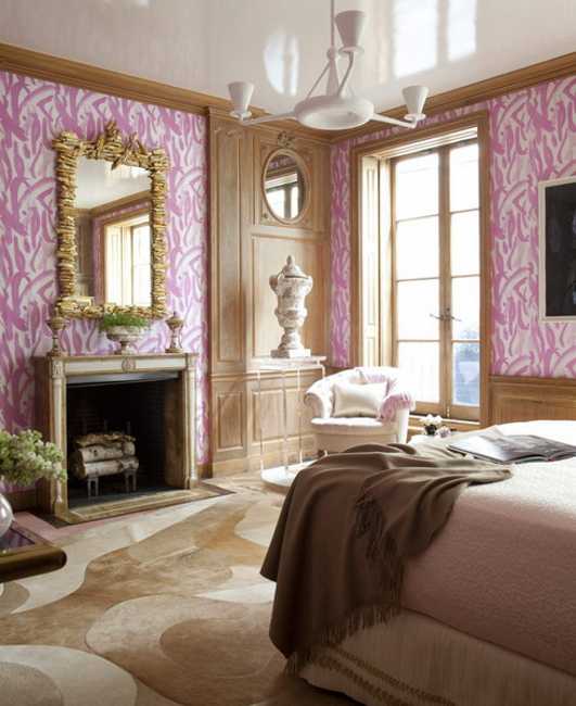 bedroom design with fireplace and pink walls
