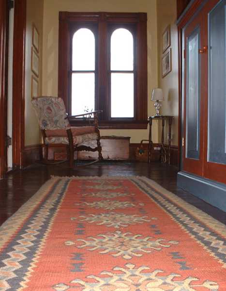 ethnic interior design with kilim, floorboard carpet