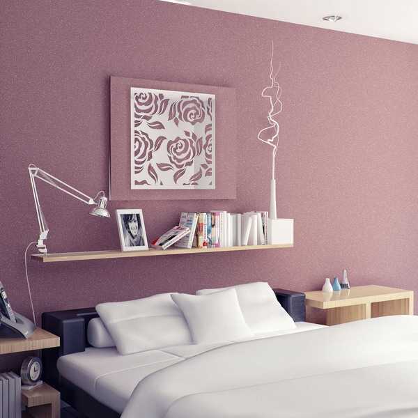 decorative wall mirror on purple wall