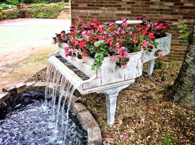 gran piano in wells and containers for flowers recycled