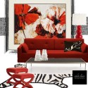 red accent wall design with floral wallpaper and red living room furniture