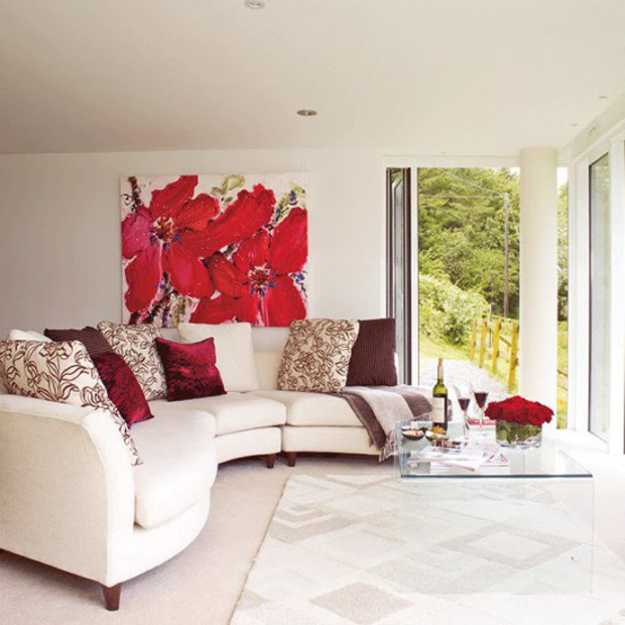 white Living room furniture with red pillows and accent wall design in red color 