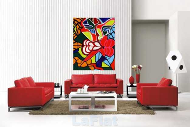 red living room furniture and bold wall art