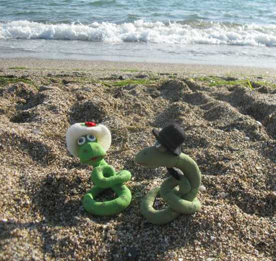 crocheted snake in green color