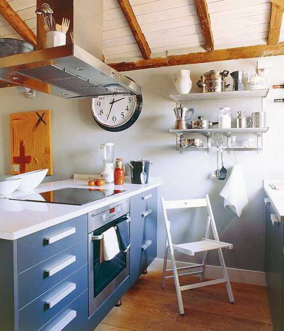 medium blue kitchen cabinets and white countertop