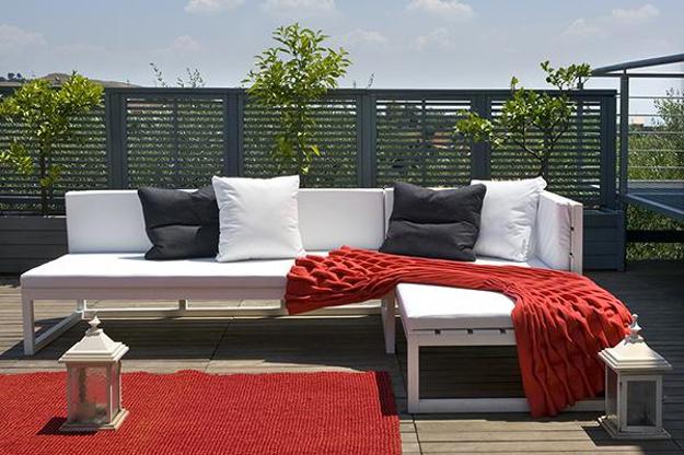 white and red outdoor sofa and stool