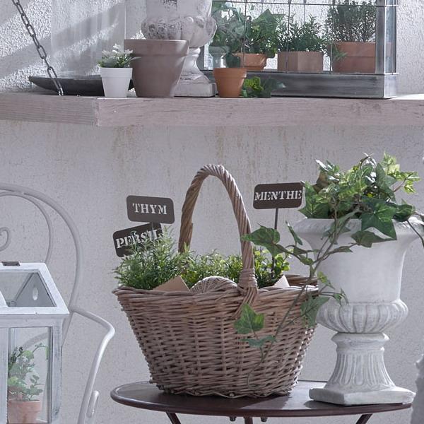 Wicker baskets and white flower pots with green plants for bedroom decoration in a classic style