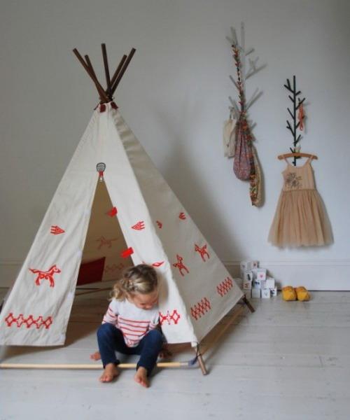 Children room decoration with white teepee fabric
